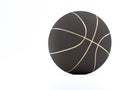 Black metalic Basketball close-up on bright studio background Royalty Free Stock Photo