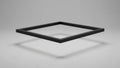 Black metallic square frame positioned diagonally appears to hover Royalty Free Stock Photo