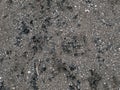 Black micro stones and sea shells sand beach as a background