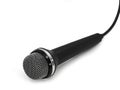 black microphone with cable isolated on white background Royalty Free Stock Photo