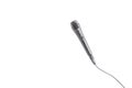 Black microphone with cable on white background Royalty Free Stock Photo