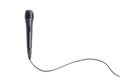 Black microphone with cable on white background Royalty Free Stock Photo