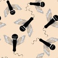 Black microphones with wings. Seamless pattern. Vector illustration on light orange background