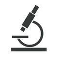 Black microscope icon on a white Royalty Free Stock Photo