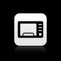 Black Microwave oven icon isolated on black background. Home appliances icon. Silver square button. Vector Royalty Free Stock Photo