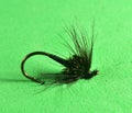 Black Midge trout fly imitation Royalty Free Stock Photo