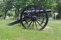 A Black Military Canon in a Cemetery Royalty Free Stock Photo