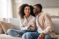 black millennial couple celebrating positive pregnancy test result at home Royalty Free Stock Photo