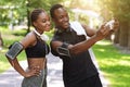 Black Millennial Couple Taking Selfie On Smartphone While Doing Sport Together Outdoors Royalty Free Stock Photo