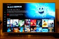 Black Mirror - Netflix television screen with popular series choice. Movies