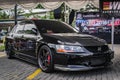 Black Mitsubishi Lancer evolution IX CT9A sedan