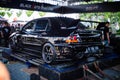 Black Mitsubishi Lancer Evolution IX on dyno