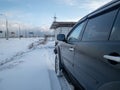 Black Mitsubishi Pajero Sport in winter weather