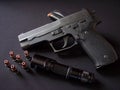 Black 9mm Semiautomatic pistol handgun with ammo and flashlight