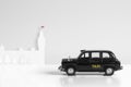 Black Model taxi and houses of parliament London concept Royalty Free Stock Photo