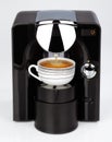 A black modern espresso coffee machine is making a coffee Royalty Free Stock Photo