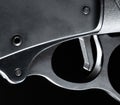 Close-up of a grooved trigger on a lever-action rifle Royalty Free Stock Photo