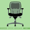 Black modern office armchair over green background Royalty Free Stock Photo