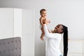 Black mom playing with her cute little baby Royalty Free Stock Photo