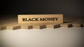 Black money written on wooden surface. finance and politics