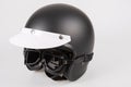 Black motorcycle helmet with a visor and goggles anti-sun protective retro and vintage style cafe racer Royalty Free Stock Photo