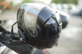 Black motorcyclist helmet. Biker head protection. Safety on road