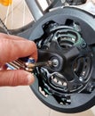 Master repairing mountain bike pedals Royalty Free Stock Photo