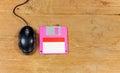 Black Mouse computer and floppy disk Royalty Free Stock Photo
