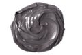 Black mud facial mask swatch. Pore-reducing mattifying beauty treatment Royalty Free Stock Photo