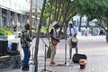 Black musicians playing on the street in Victoria and Alfred waterfront area in Cape Town, South Africa Royalty Free Stock Photo