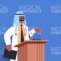 Black muslim male doctor giving speech at tribune with microphone medical world conference medicine healthcare