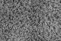 Black natural fleece carpet texture background. Dark wool fabric texture. fragment gray shaggy mat Royalty Free Stock Photo