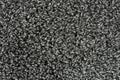 Black natural fleece carpet texture background. Dark wool fabric texture. fragment gray shaggy mat Royalty Free Stock Photo