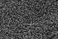 Black natural fleece carpet texture background. Dark wool fabric texture. fragment gray shaggy mat Royalty Free Stock Photo