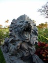 Black natural stone Roaring lion on Display in garden Royalty Free Stock Photo