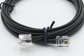 Black network cable isolated on white background Royalty Free Stock Photo