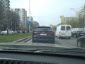 Black new Audi Q8 in traffic. Road view through car windshield, cars on road in traffic in Bucharest, Romania, 2021 Royalty Free Stock Photo