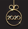 Black 2020 New Year background with gold Christmas ball