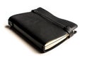 Black notebook with leather covers in perspective