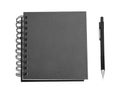 Black notebook and pencil isolated on white background Royalty Free Stock Photo