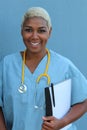 Black nurse isolated on blue Royalty Free Stock Photo