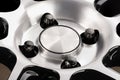 black nuts on the alloy wheel hub close-up Royalty Free Stock Photo