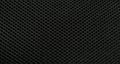 Black nylon fabric pattern texture background.