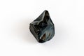 Black Obsidian isolated on white background Royalty Free Stock Photo