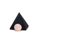 Black obsidian pyramid and rose quartz ball. Reiki concept. Isolated on white background, copy space Royalty Free Stock Photo
