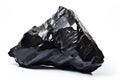 Black Obsidian volcanic glass crystal on white background Royalty Free Stock Photo