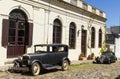 Black and obsolete cars on one of the cobblestone streets, in the city of Colonia del Sacramento, Uruguay. It is one of the oldest Royalty Free Stock Photo