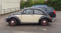 Black and off white Volkswagen Beetle car in Prague Royalty Free Stock Photo