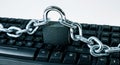 Cyber attack threat secured, chained computer keyboard