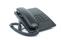 Black office phone with handset on-hook Royalty Free Stock Photo